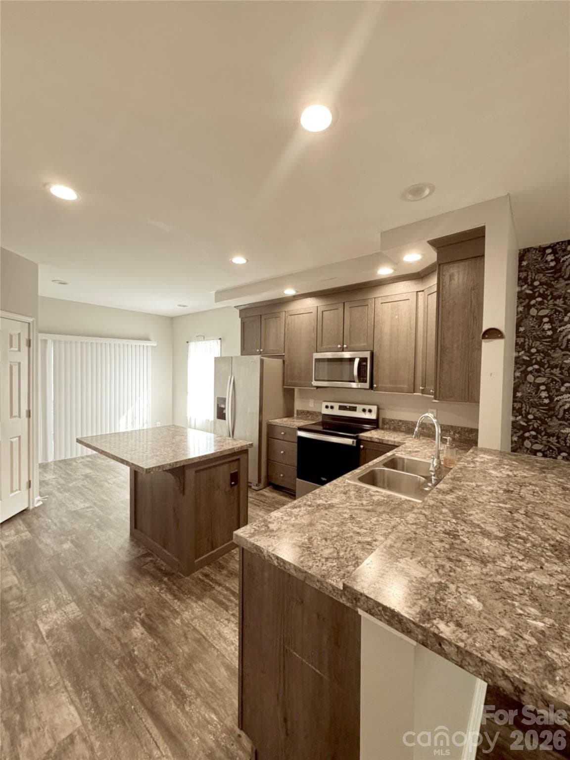 open kitchen with tons of cabinet space - 323 Martin Street, Shelby