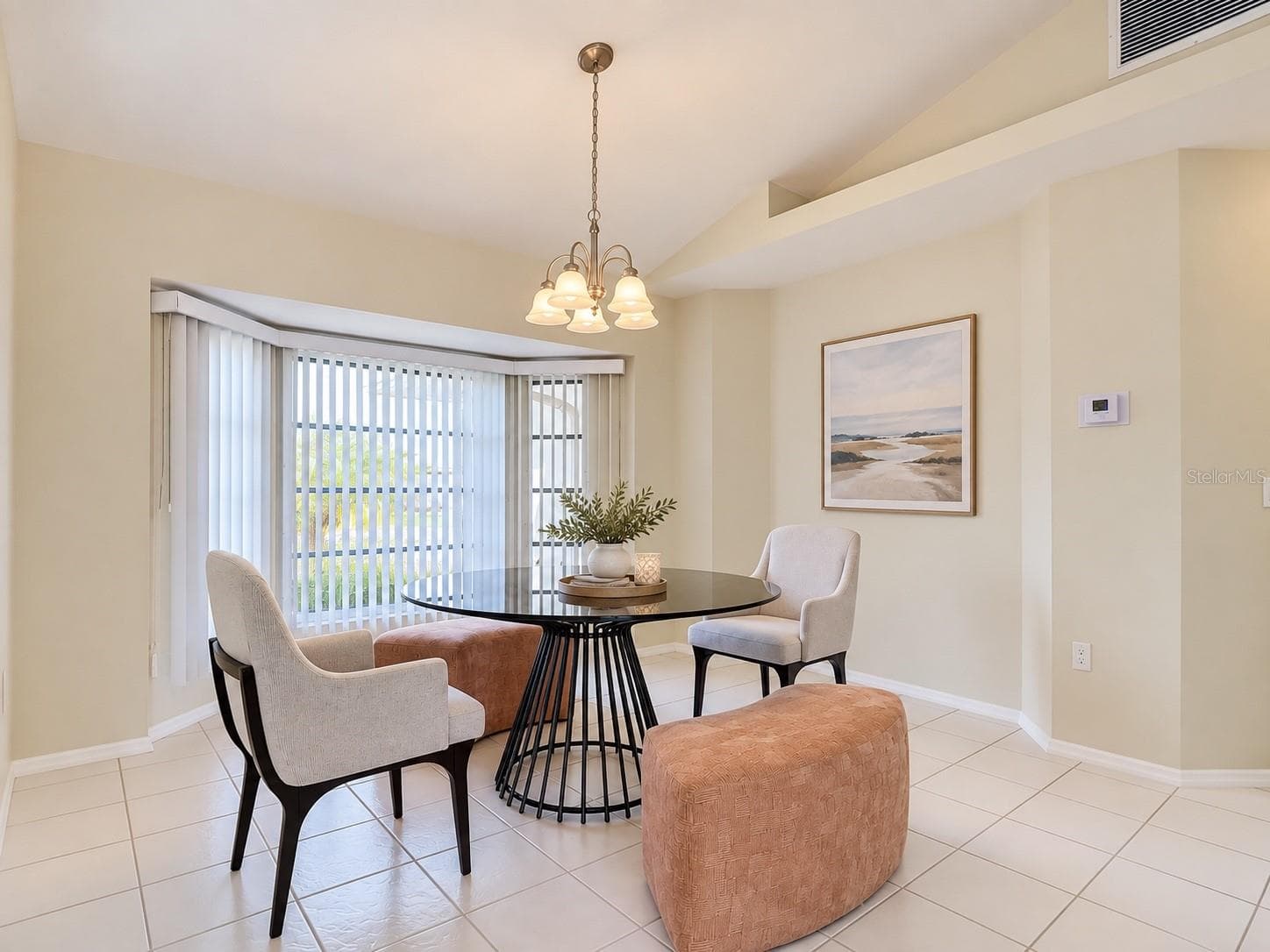 9. Dining area with large windows. - 63 CLUBHOUSE RD, ROTONDA WEST