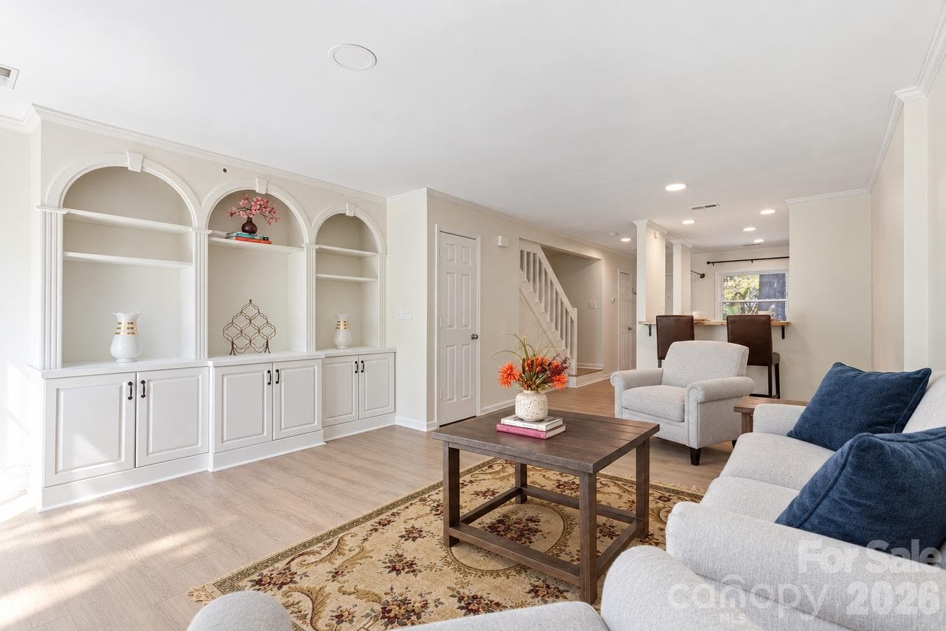 Natural light and updated flooring give the living room a bright, comfortable feel. - 3858 Mosscroft Lane, Charlotte
