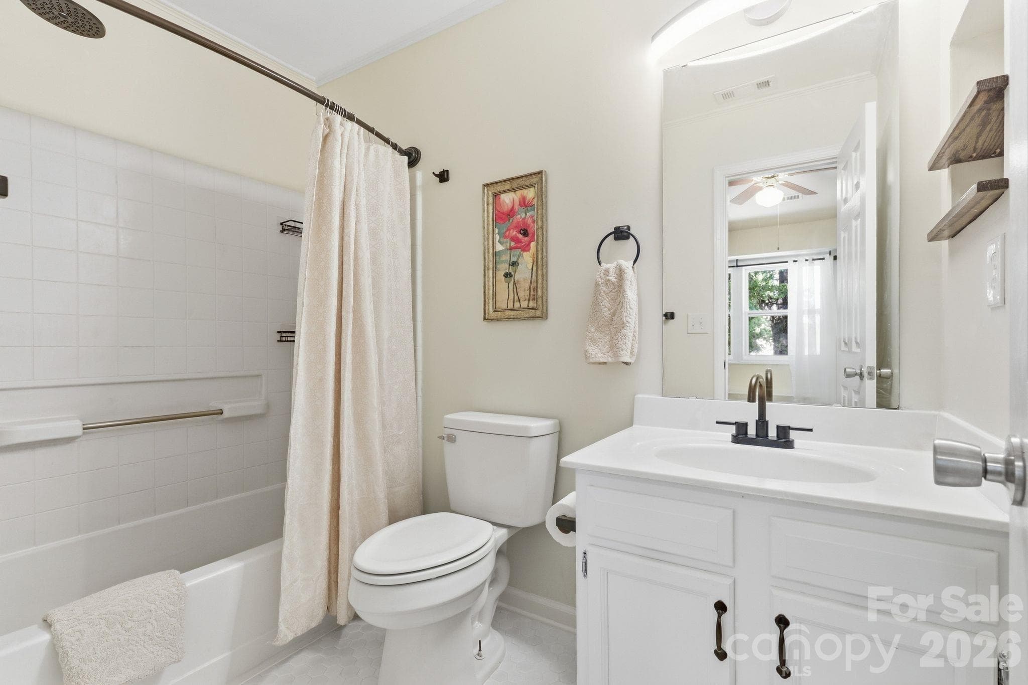 Full bathroom offers a comfortable space for daily routines and guests alike. - 3858 Mosscroft Lane, Charlotte