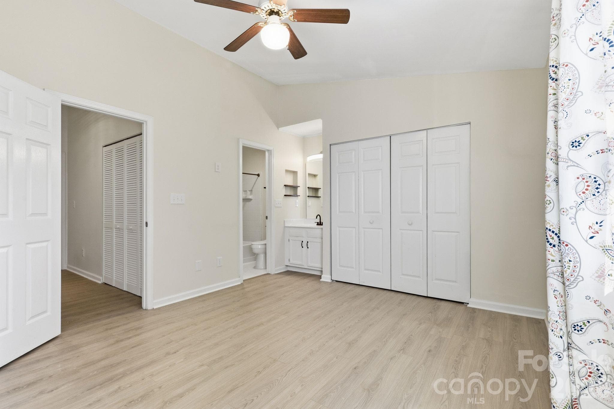 Spacious bedroom offers room to relax, with flexibility for a reading nook or work area. - 3858 Mosscroft Lane, Charlotte