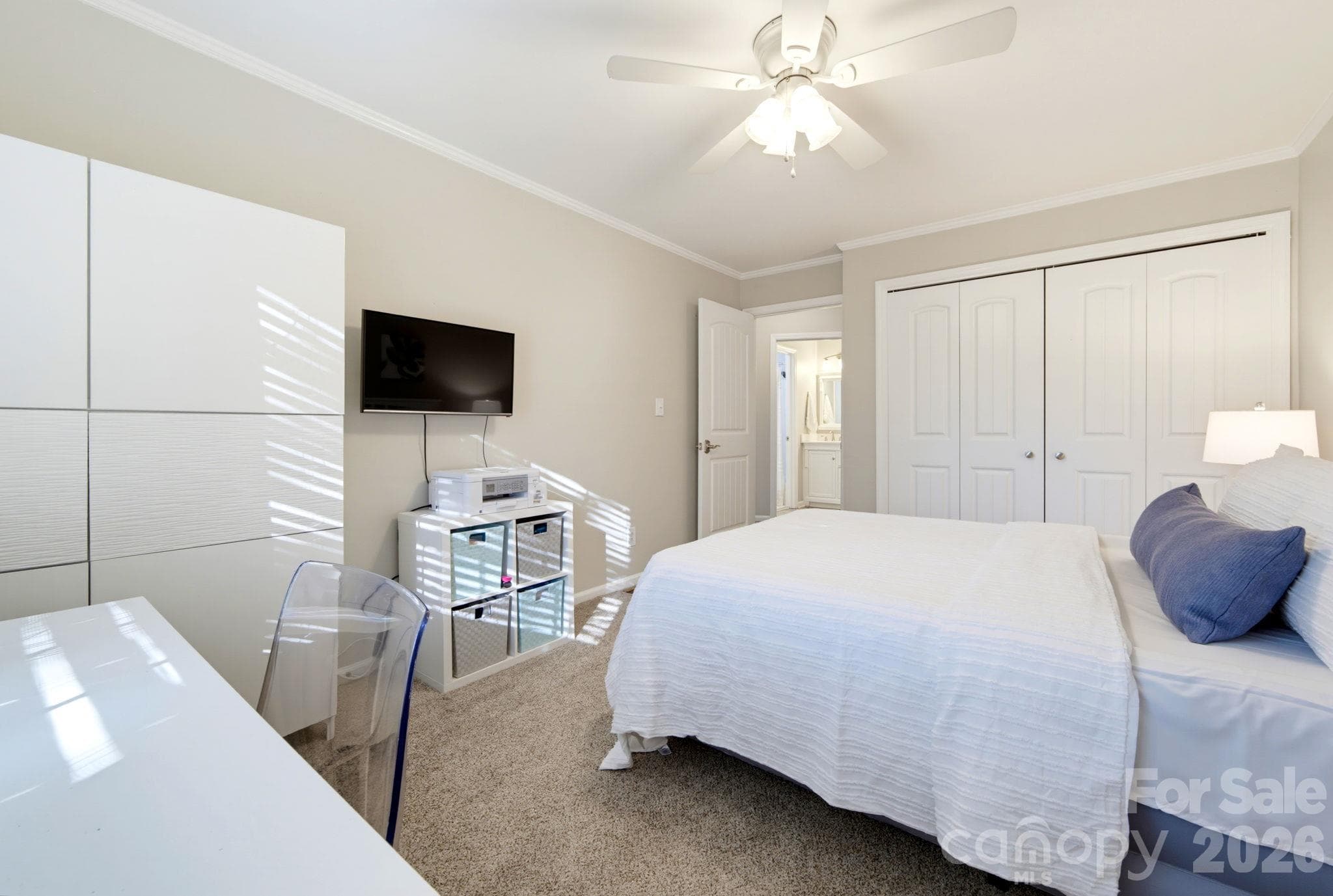 Versatile secondary bedroom easily accommodates overnight guests, additional storage and a home office setup - 5901 Quail Hollow Road, Charlotte