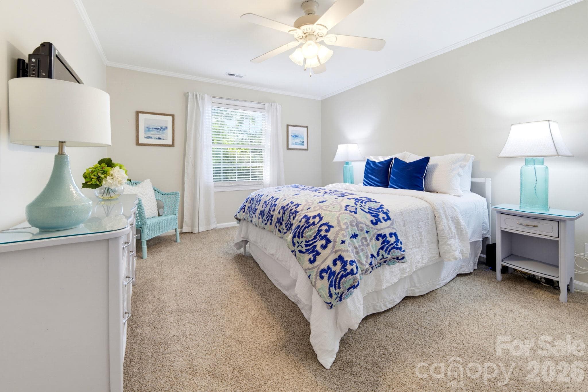 Spacious primary bedroom with plenty of room for additional furnishings and enjoy the same relaxing outdoor views. - 5901 Quail Hollow Road, Charlotte