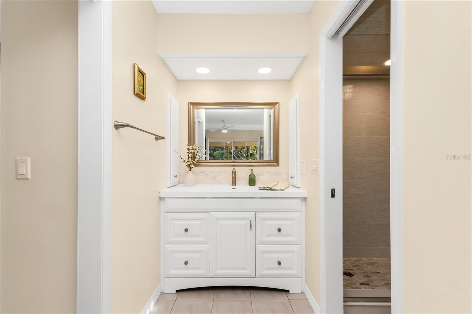 Updated ensuite primary bath. - 1311 TUSCANY DR, PUNTA GORDA