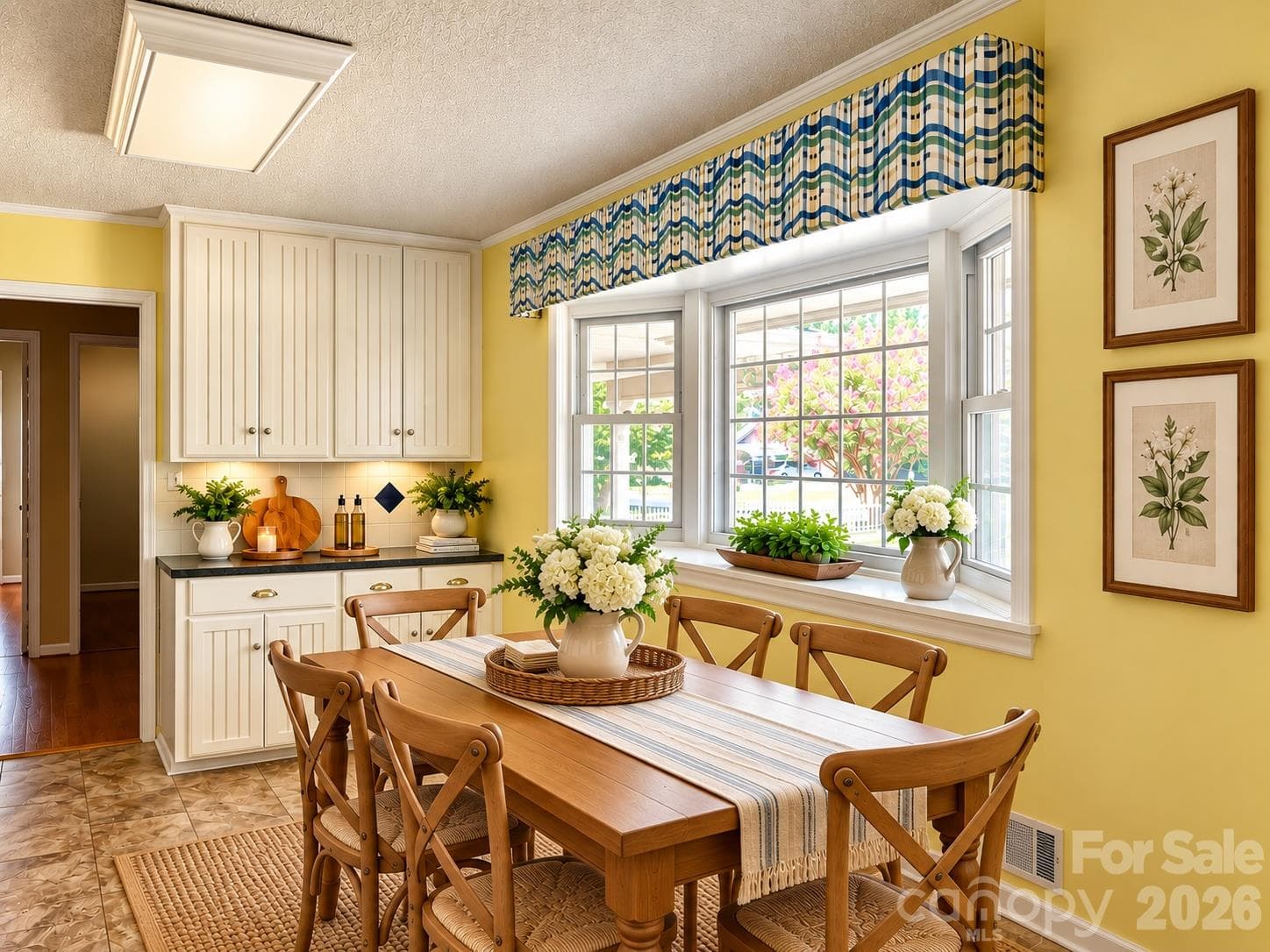 Kitchen Hutch and bay window area has been staged with CHATGPT/AI - 620 Mcdowell Drive, Chester
