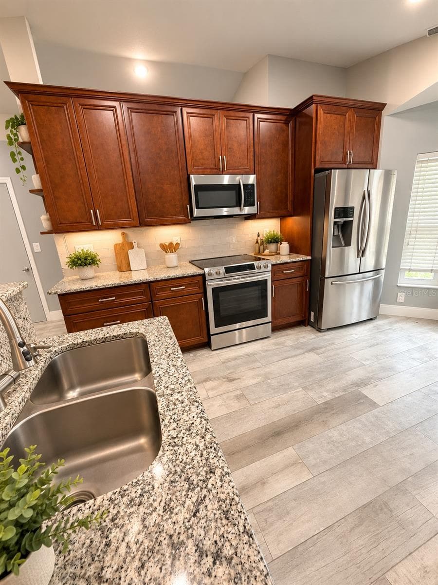 Condominium at 179 DAHLIA VILLAGE CIR #63, ORLANDO, photo 7 of 32