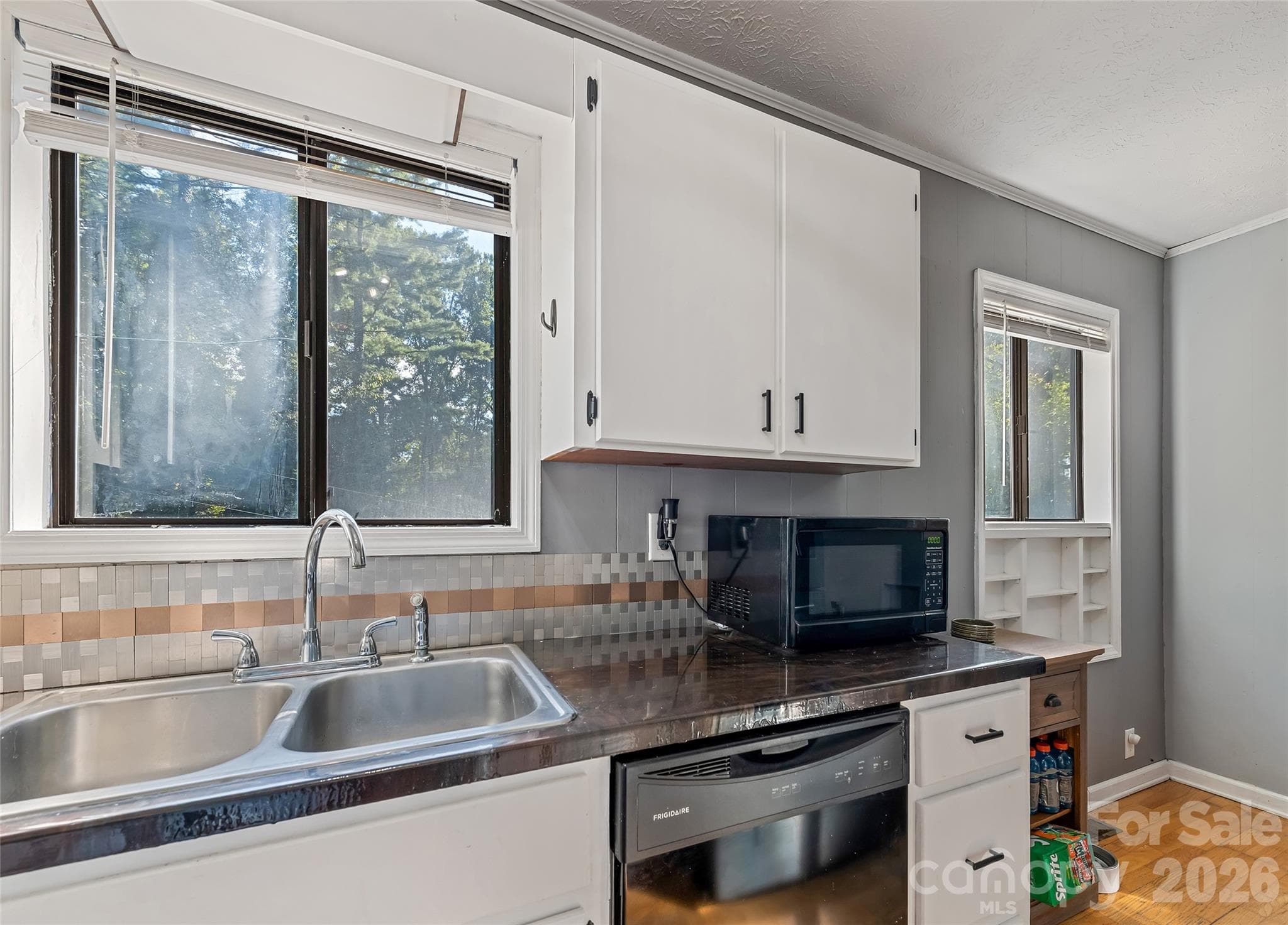 Kitchen adjacent to sliding doors to back deck/yard. - 177 Forest Drive, Clyde