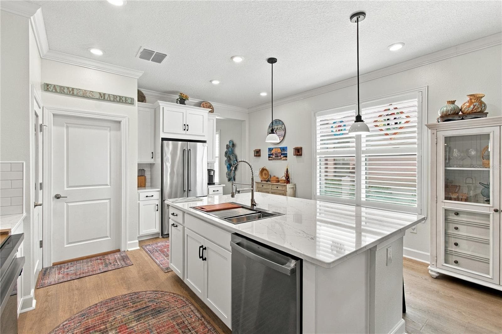 Kitchen showing shutters on the window - 1120 VIA GALUPPI ST, POINCIANA