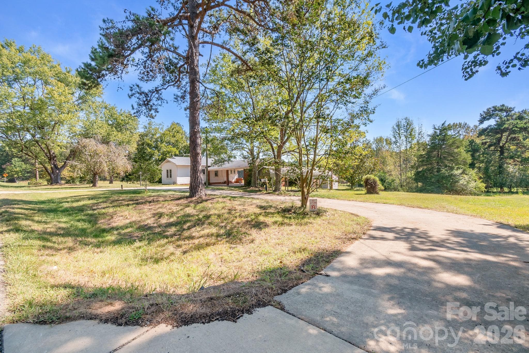 2 way circular driveway - 7615 S Rocky River Road, Monroe