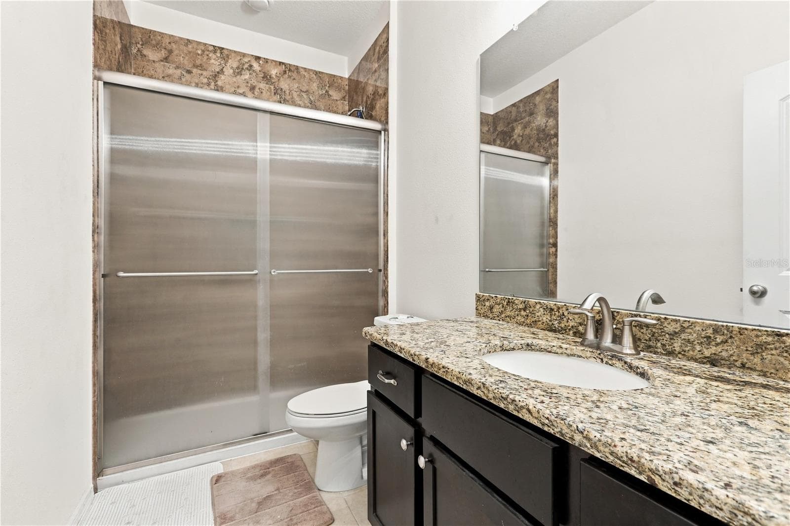 SECOND BATHROOM WITH COMPLETELY RENOVATED WALK IN SHOWER - 12511 BALLENTRAE FOREST DR, RIVERVIEW