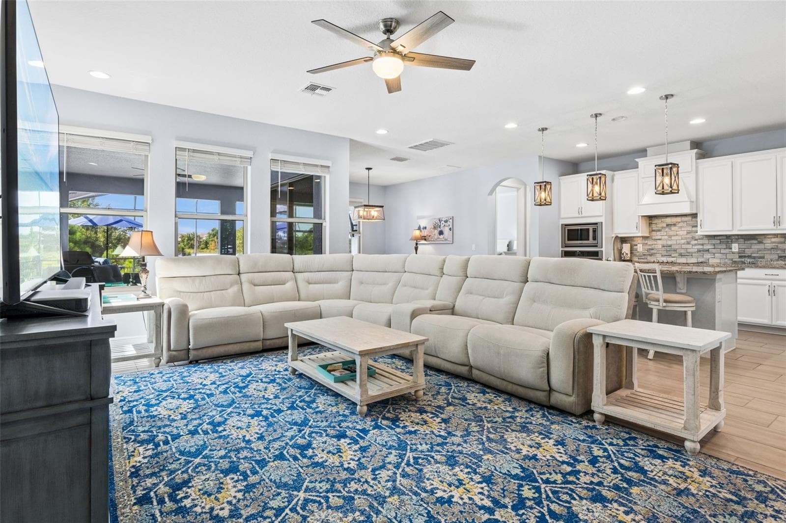 Overlooks the Patio andLake - 10048 BEACH PORT DR, WINTER GARDEN