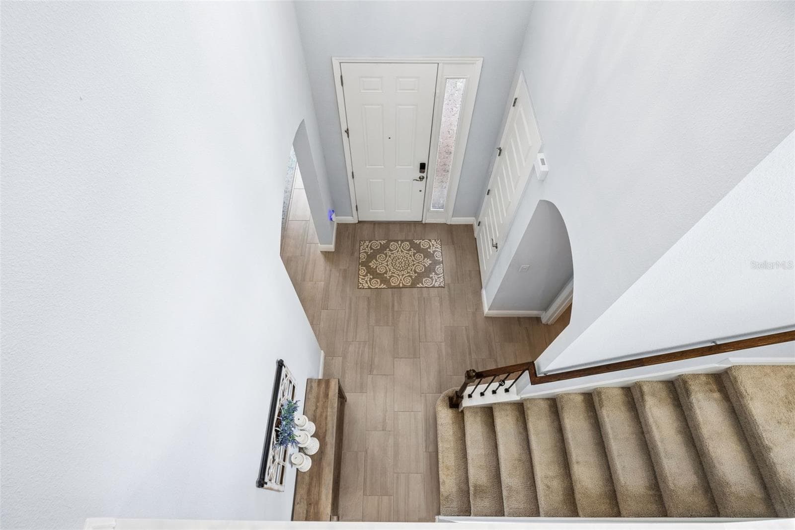 Two story Foyer - Stairs with Wrought Inron Railing - 10048 BEACH PORT DR, WINTER GARDEN