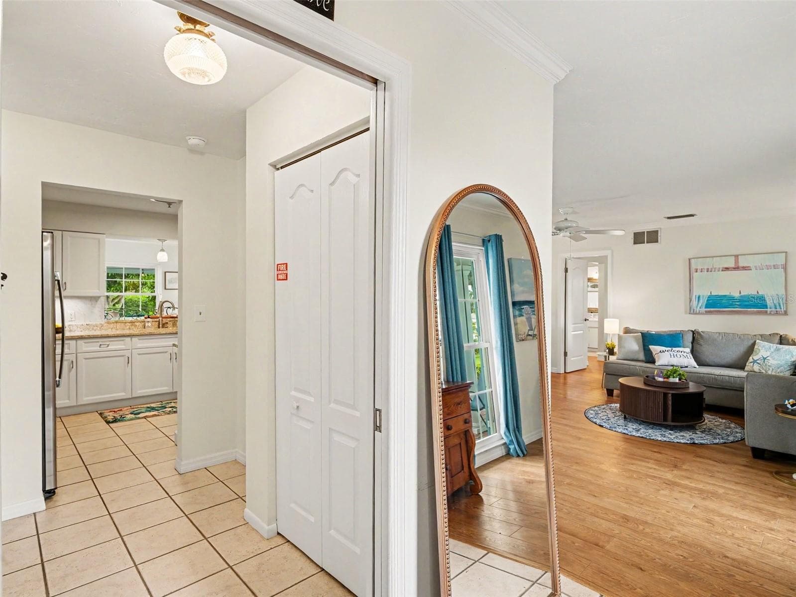 FOYER, LIVING KITCHEN, DUAL CLOSETS AT ENTRY - 1110 DE NARVAEZ AVE, BRADENTON