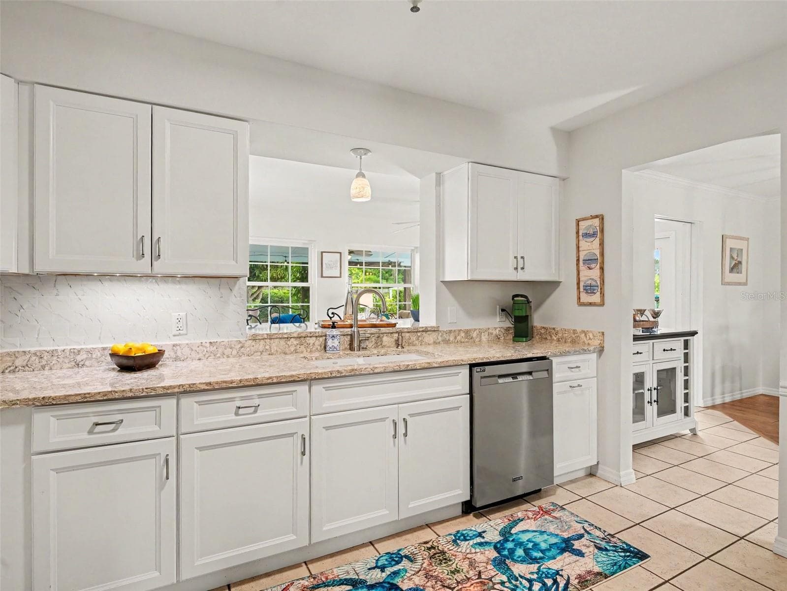 KITCHEN, PASS THROUGH BAR TO FLORIDA ROOM - 1110 DE NARVAEZ AVE, BRADENTON