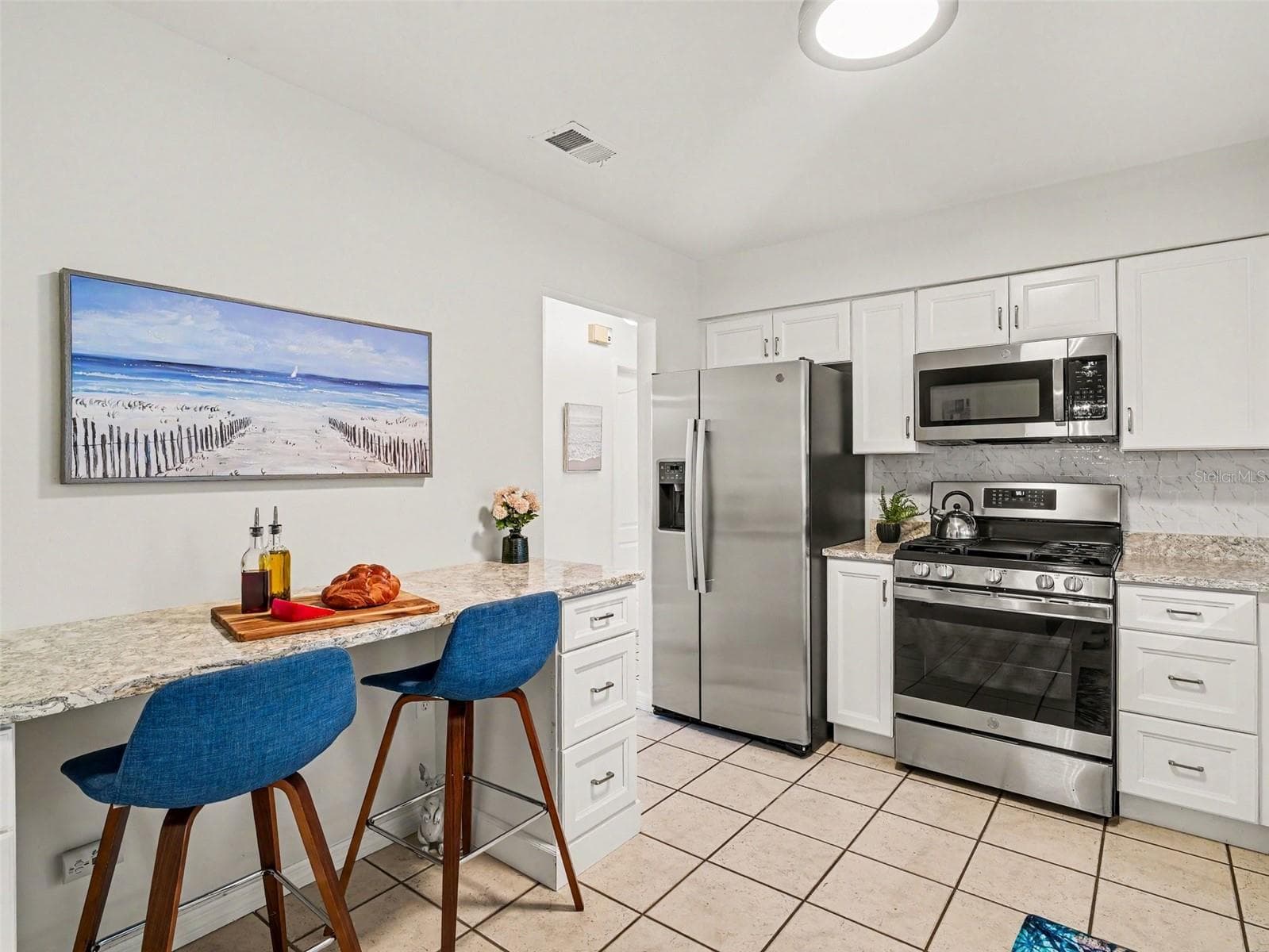 KITCHEN EAT IN/DESK AREA. - 1110 DE NARVAEZ AVE, BRADENTON