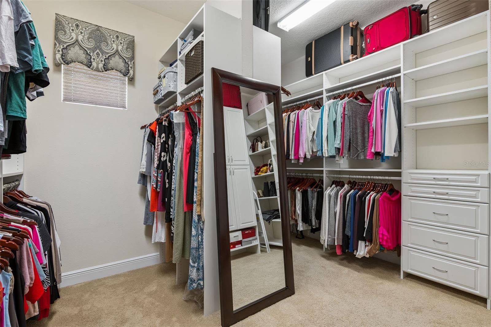 Oversized Primary closet with built ins - 2246 SOARING EAGLE PL, LAKE MARY