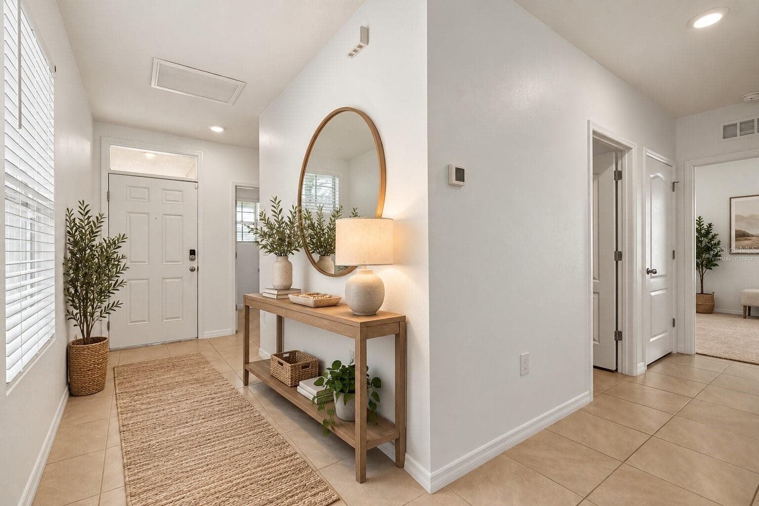 Virtually staged bright, welcoming entryway with neutral finishes and an open, airy feel. - 3658 CASPIAN ST, LEESBURG