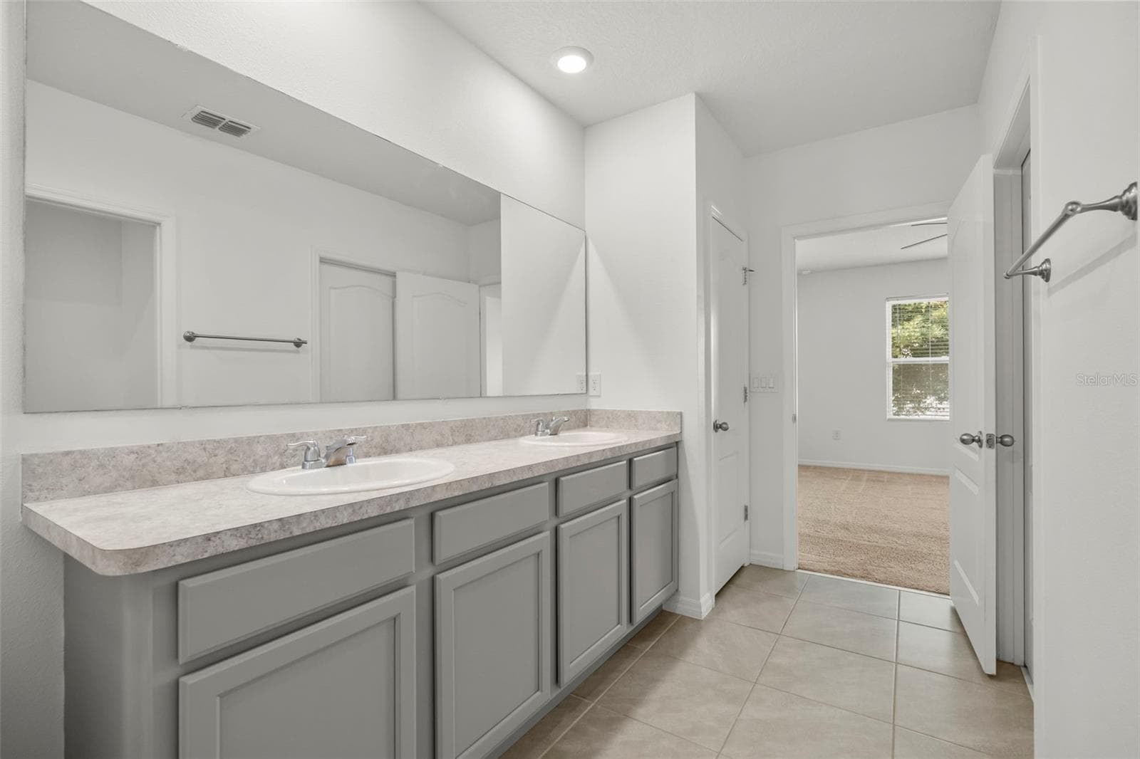 Additional view of the primary bath with ample vanity space. - 3658 CASPIAN ST, LEESBURG