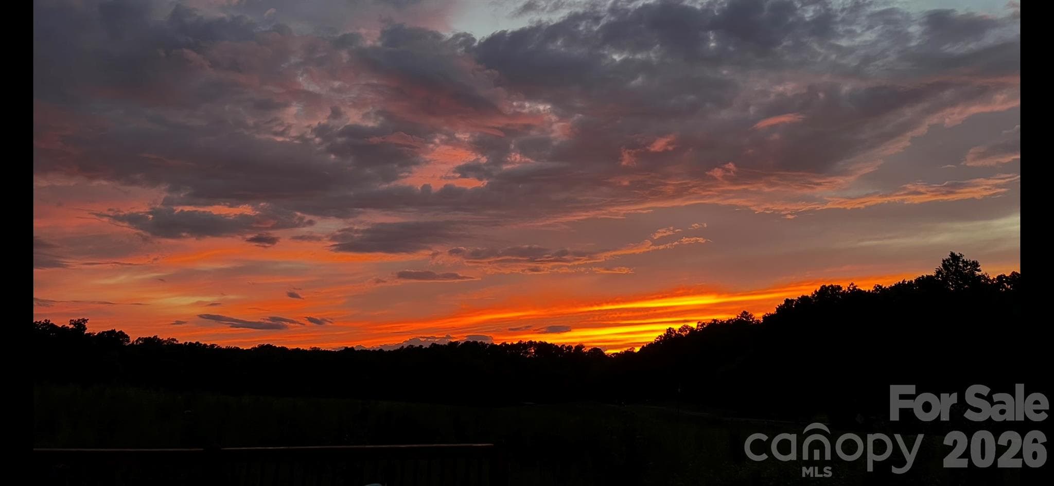 sunset from deck - 131 Burch Hutchins Road, Forest City
