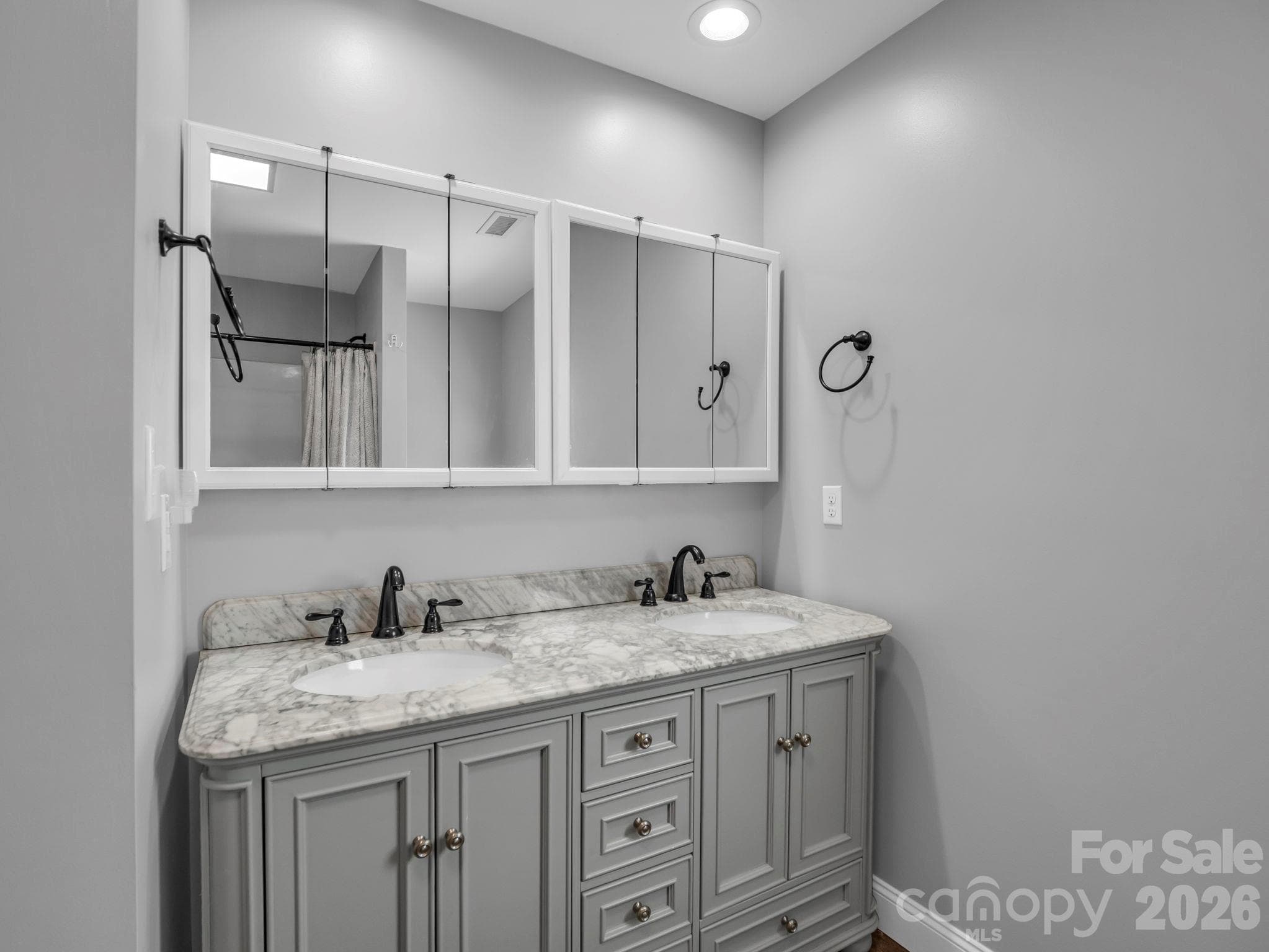 Primary bath has double vanity - 131 Burch Hutchins Road, Forest City