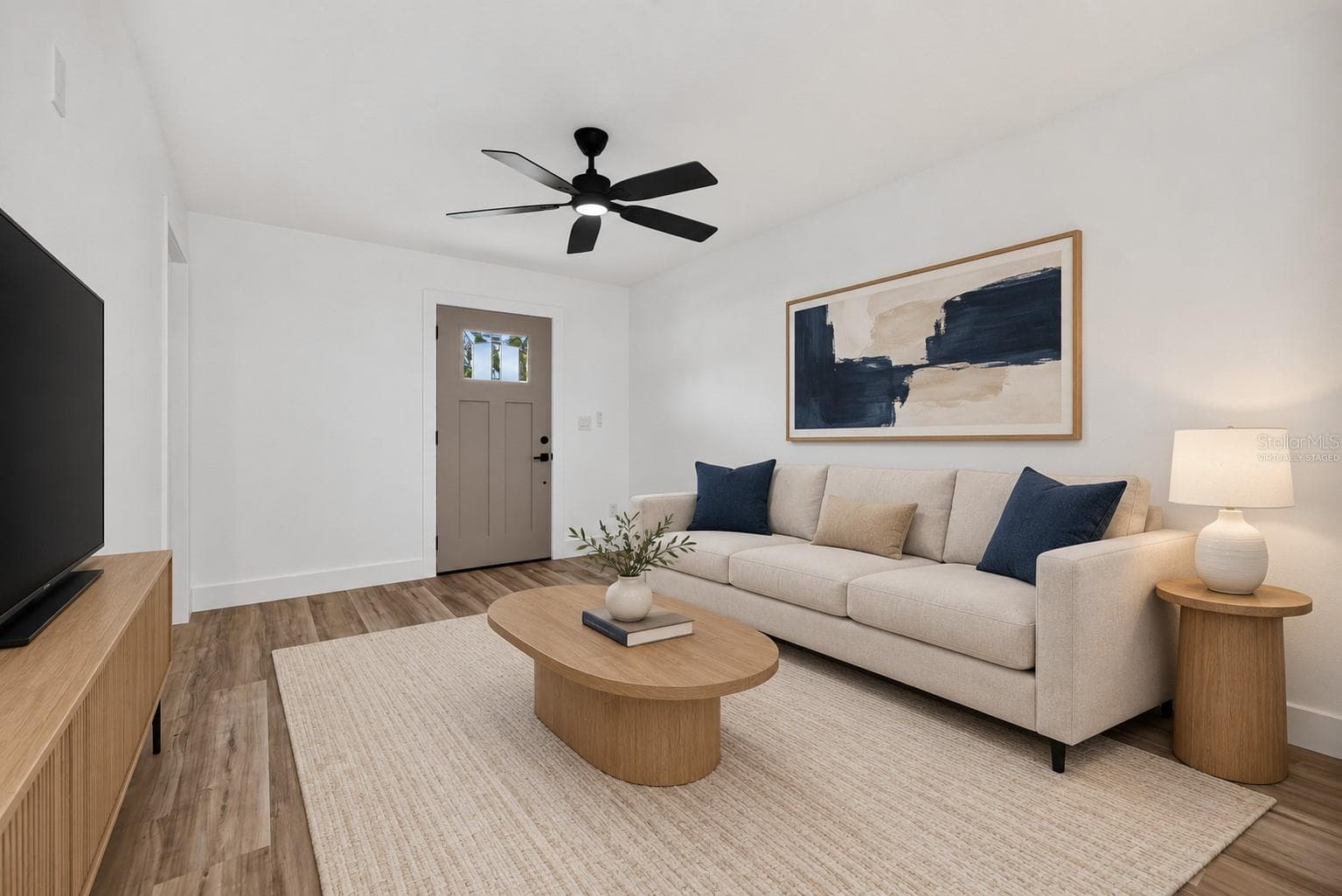 VIRTUALLY STAGED. First Floor Living Room - 11317 SYLVAN GREEN LN, RIVERVIEW