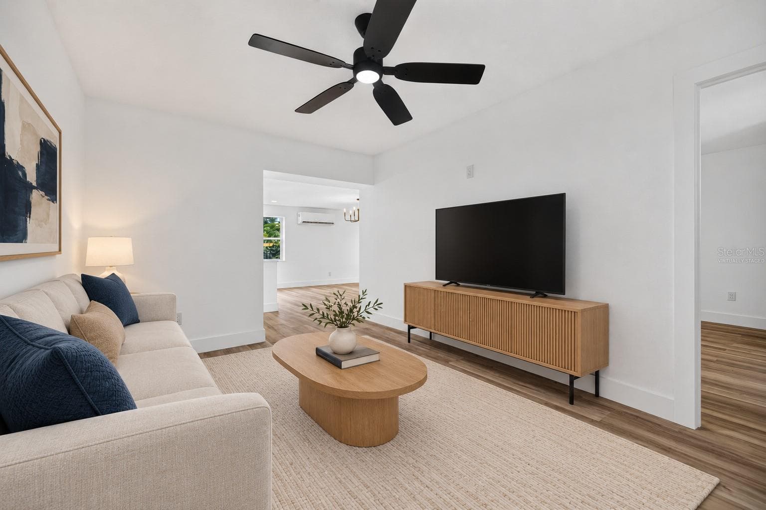 VIRTUALLY STAGED. First Floor Living Room - 11317 SYLVAN GREEN LN, RIVERVIEW