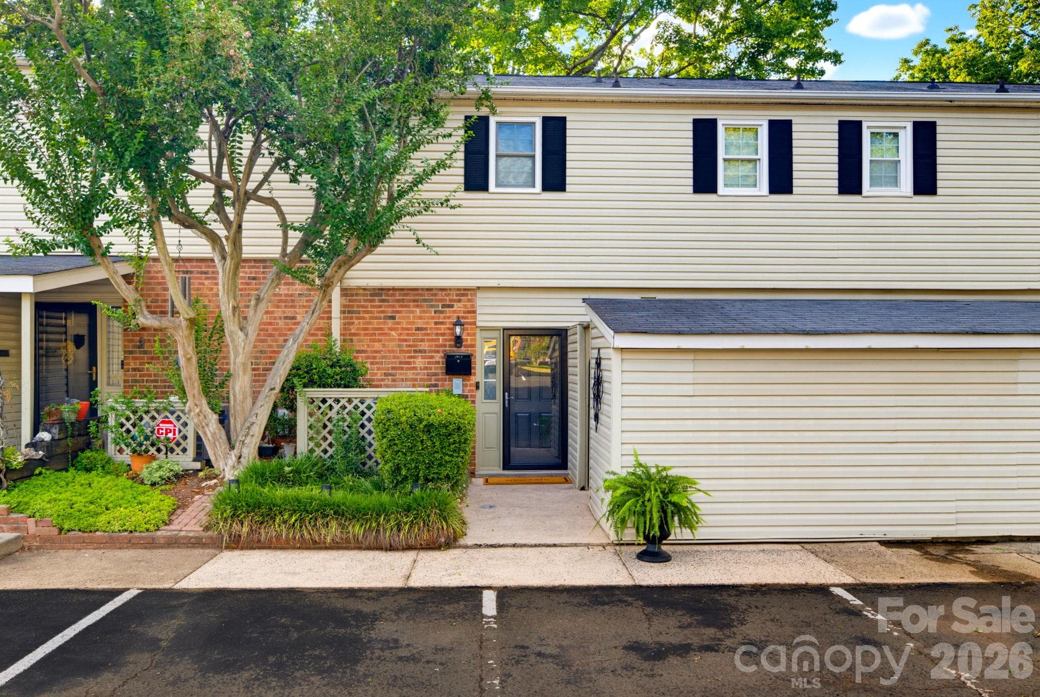Welcome home!  Two assigned parking spaces located directly in front, plus additional visitor parking. - 5901 Quail Hollow Road, Charlotte