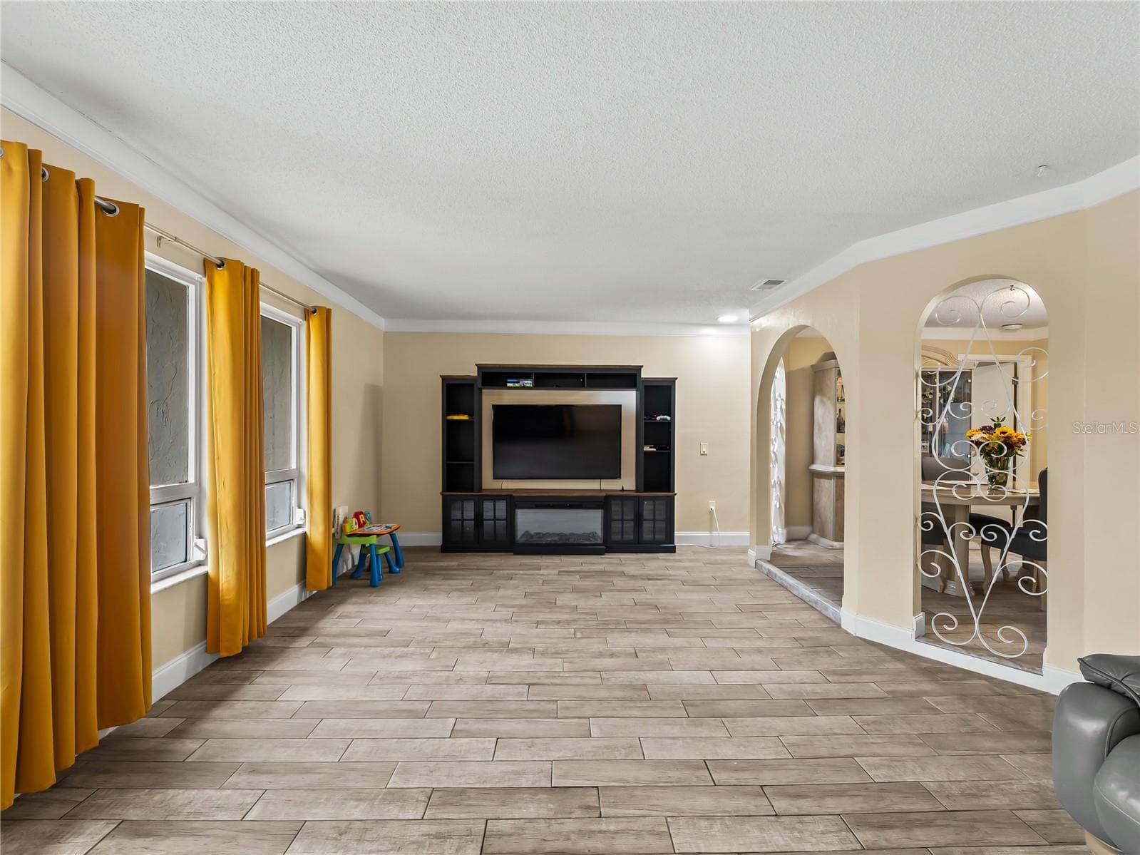 Living room.  Note the entry to the dining room on the right. - 20343 RUTHERFORD AVE, PORT CHARLOTTE
