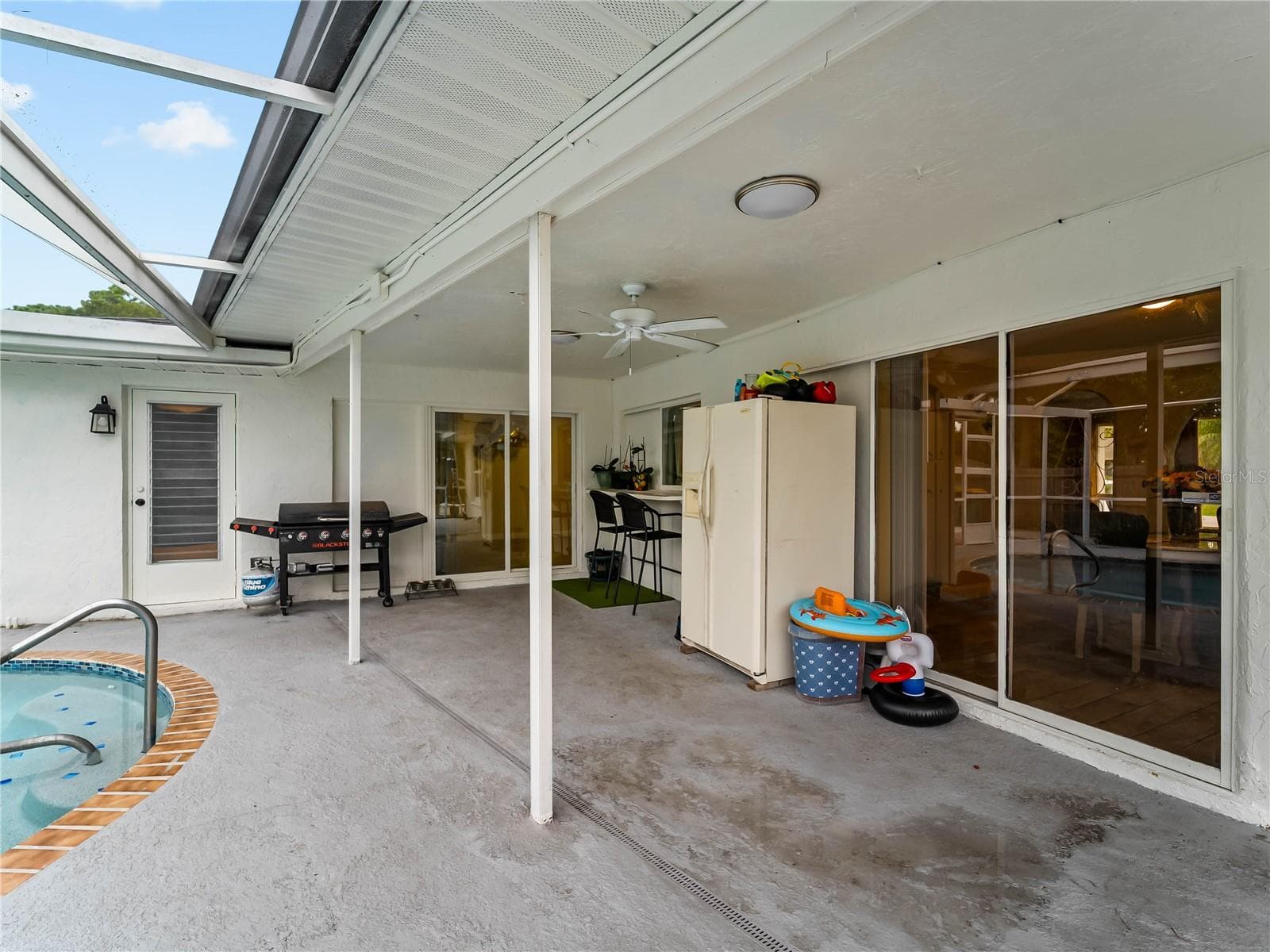 Enough shaded space for tables and chairs. - 20343 RUTHERFORD AVE, PORT CHARLOTTE