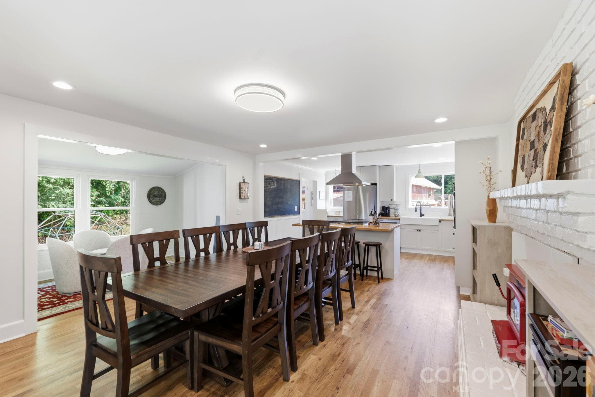 Spacious dining room withe easy flow to kitchen - 2252 Riceville Road, Asheville