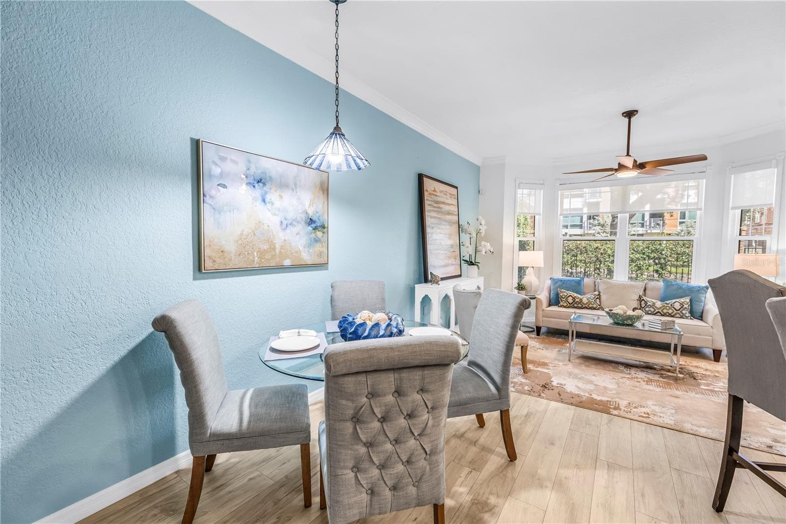 Open living and dining areas flow together comfortably, creating an inviting setting for everyday living and entertaining. - 350 2ND ST N #6, ST PETERSBURG