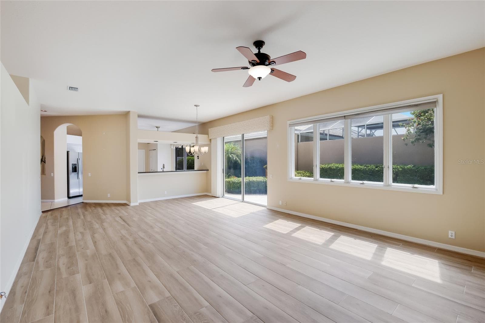 Wall of windows make the space light and bright - 8702 52ND DR E, BRADENTON
