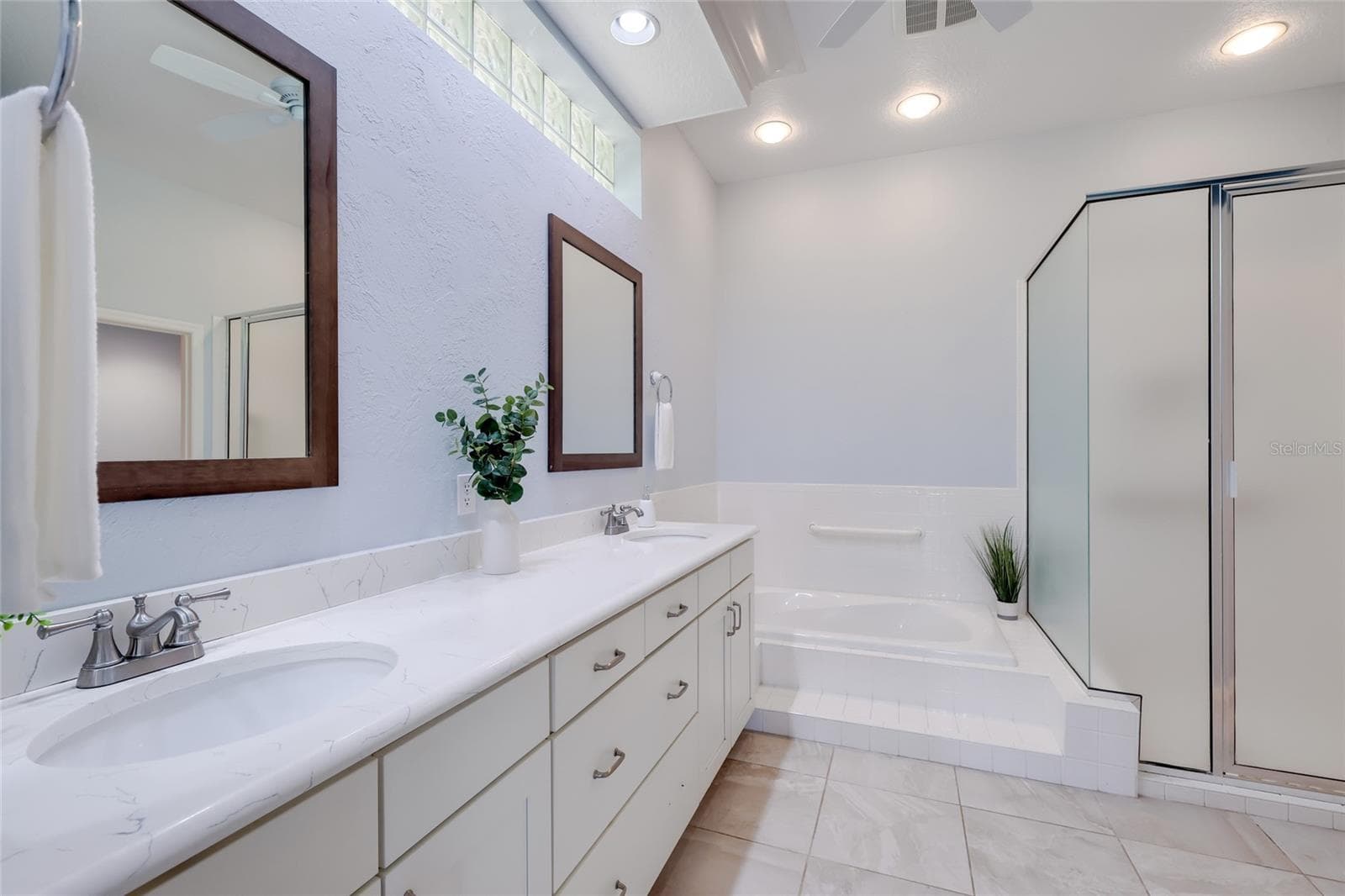 Primary bathroom with dual sinks - 8702 52ND DR E, BRADENTON