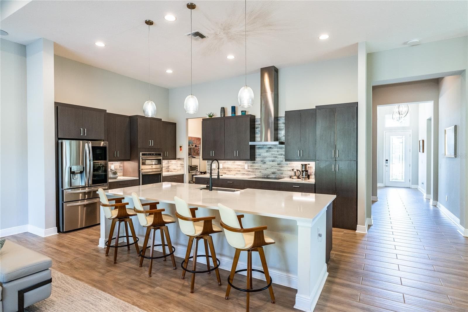 Upscale OPEN kitchen with quartz island! - 13303 TRAILING MOSS DR, DADE CITY
