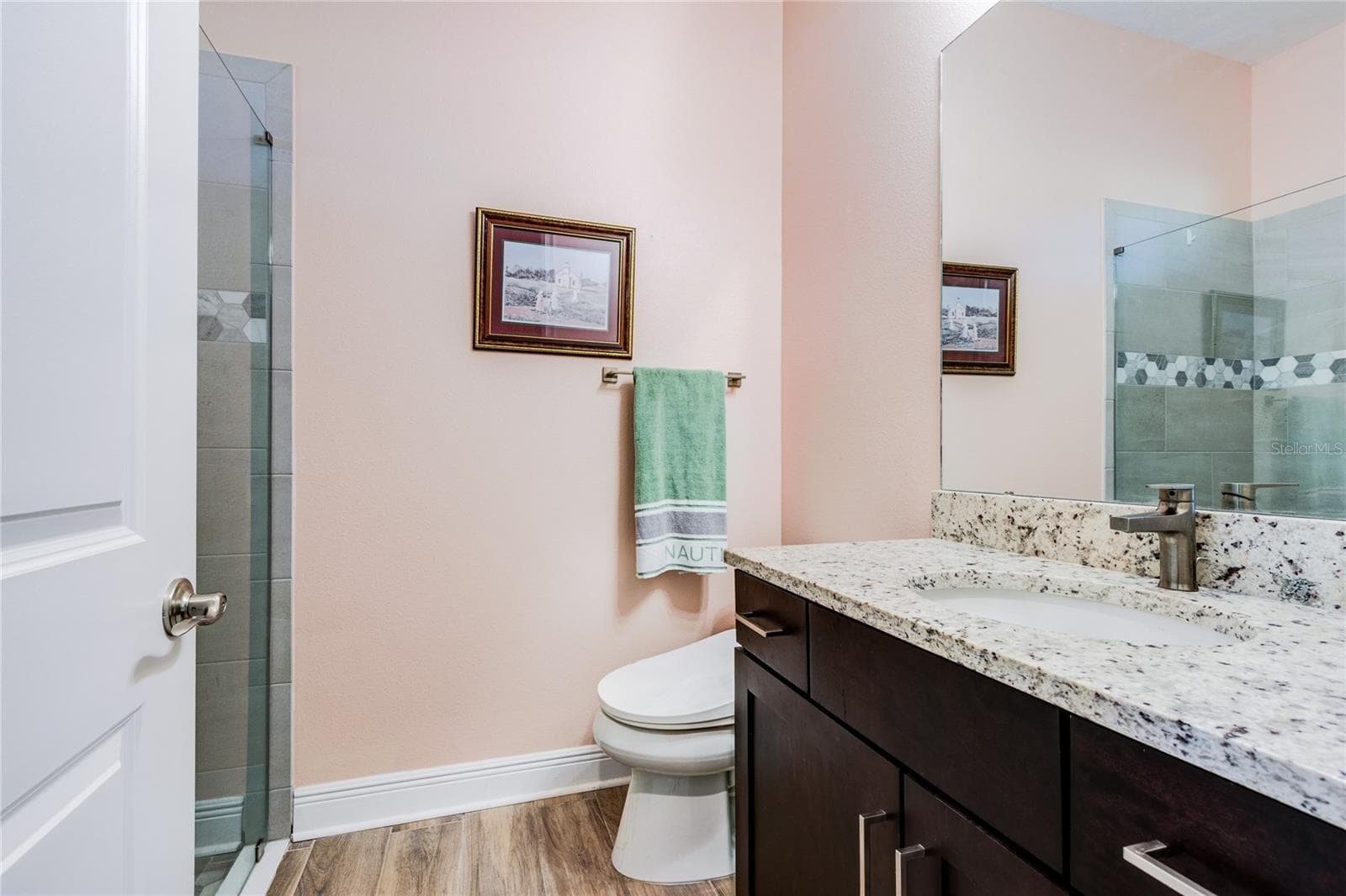 Full bath on same wing as 4th bedroom for privacy - 13303 TRAILING MOSS DR, DADE CITY