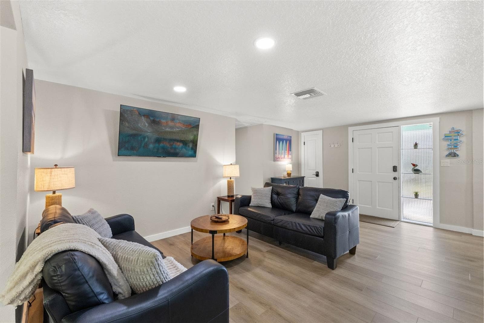 A second spacious living area adds flexibility to the 3-bedroom split floor plan and provides another comfortable place to gather. - 201 SOUTH ST, PALM HARBOR