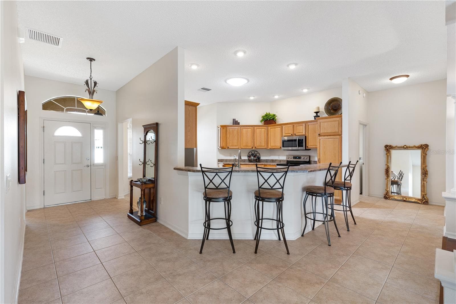 FOYER / KITCHEN VIEW - 1318 GREENVILLE WAY, THE VILLAGES