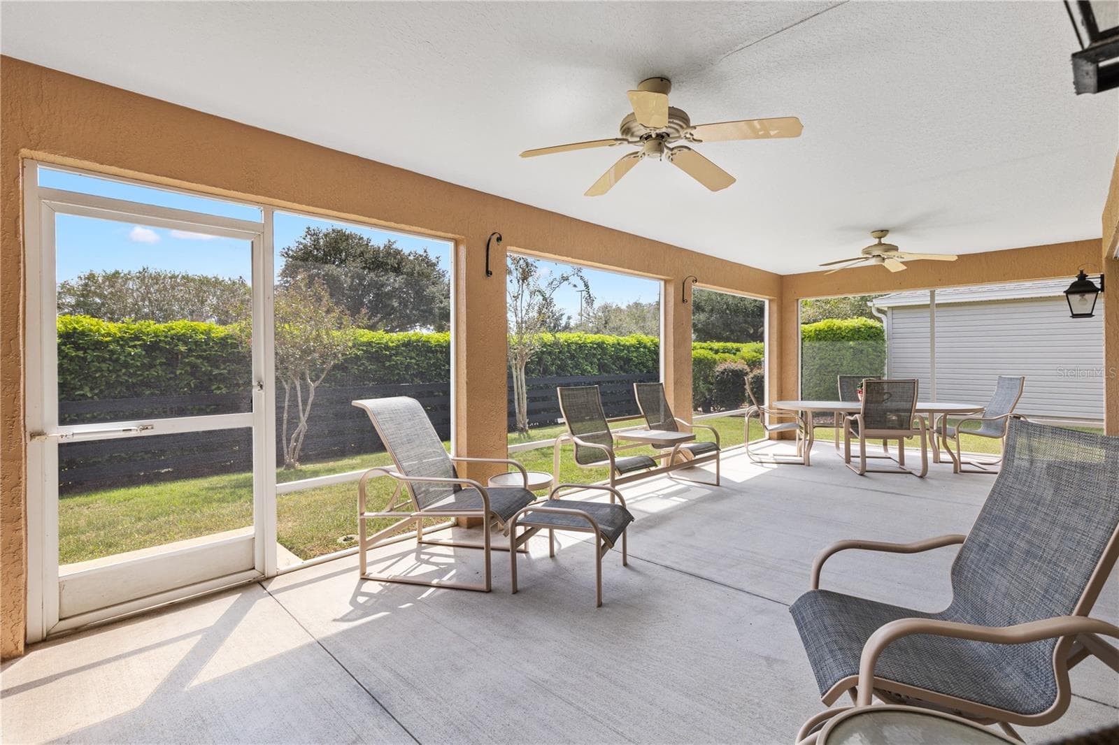 EXTENDED SCREENED LANAI - 1318 GREENVILLE WAY, THE VILLAGES
