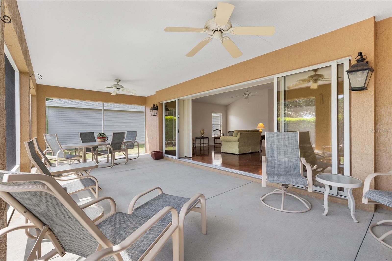 EXTENDED SCREENED LANAI - 1318 GREENVILLE WAY, THE VILLAGES