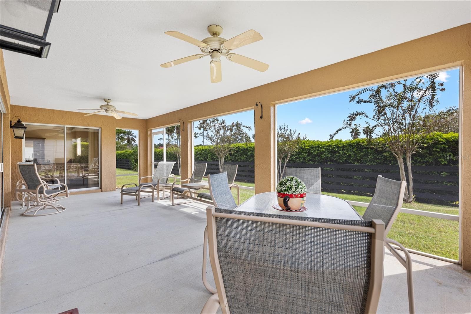 EXTENDED SCREENED LANAI - 1318 GREENVILLE WAY, THE VILLAGES