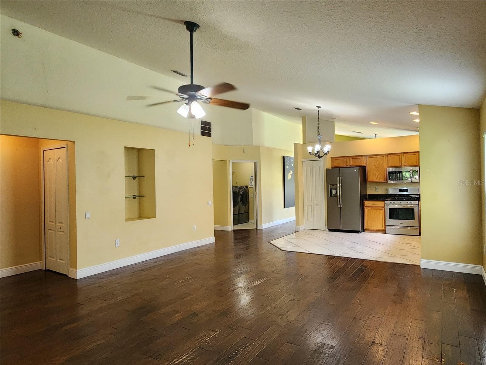 Living room and Kitchen - 30702 IVERSON DR, WESLEY CHAPEL