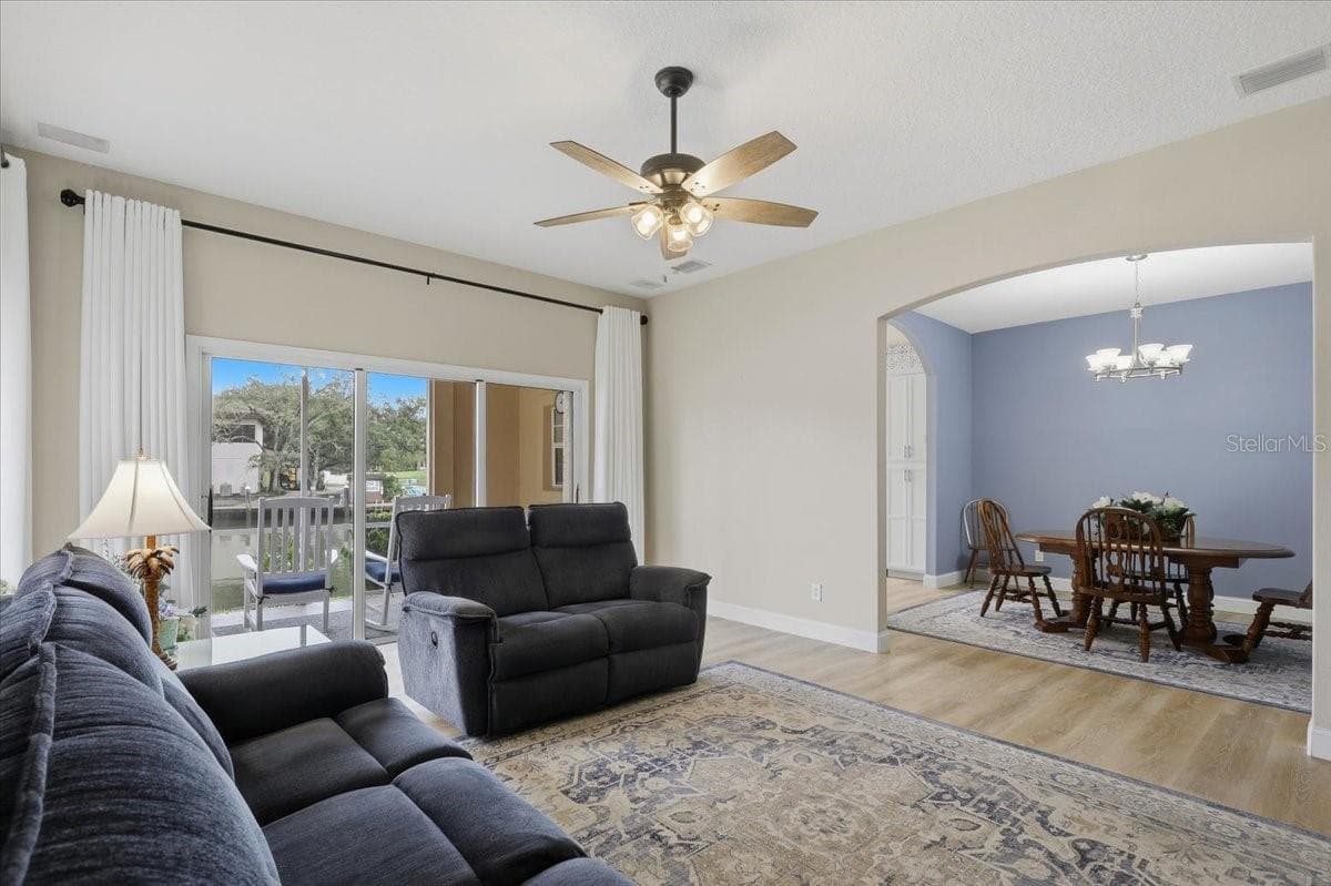 Triple sliders leads to the outside - 2 MARINA POINT PL, PALM COAST