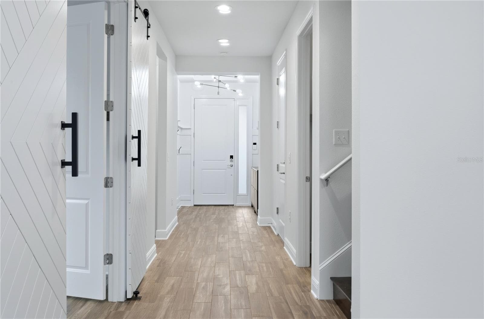Freshly painted barn doors - 5542 NATIVE HENNA CT, SARASOTA