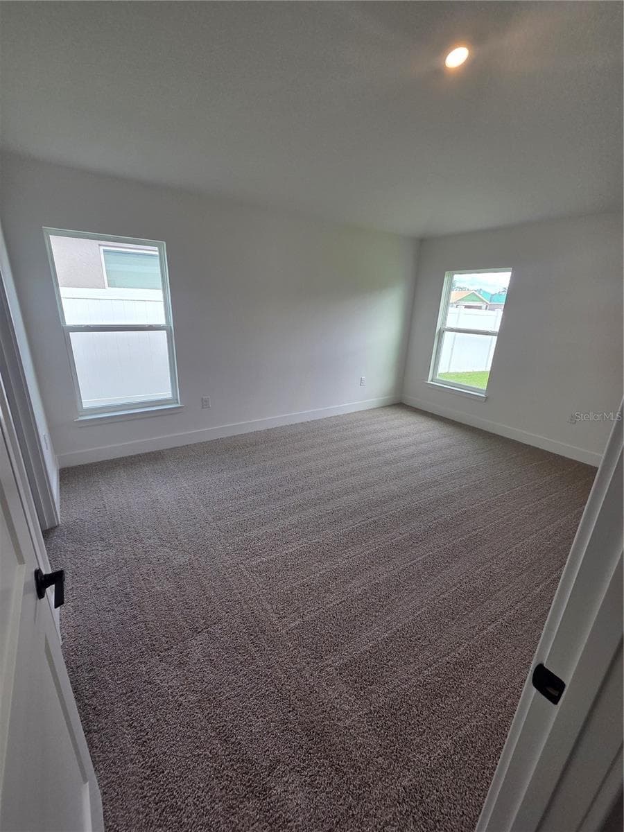 master bedroom - 9430 HIGHLAND HILLS DR ST, HUDSON