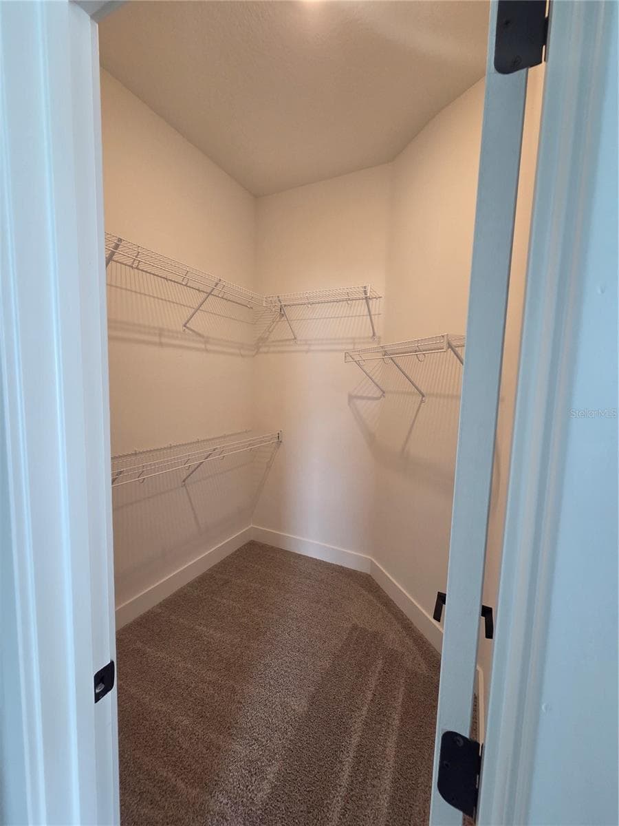 master closet - 9430 HIGHLAND HILLS DR ST, HUDSON