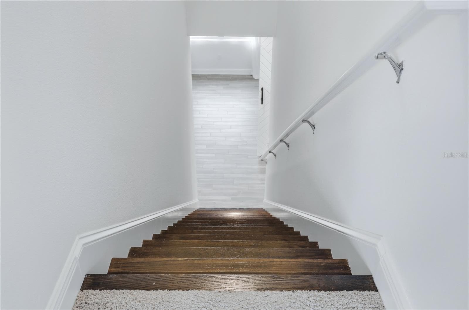 Stairway to the upstairs flexible space - 5542 NATIVE HENNA CT, SARASOTA