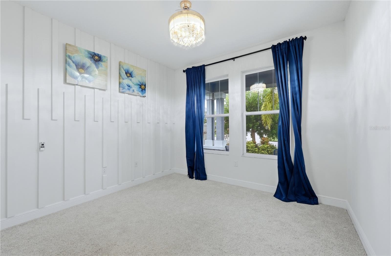 Bedroom refreshed with white accent walls - 5542 NATIVE HENNA CT, SARASOTA