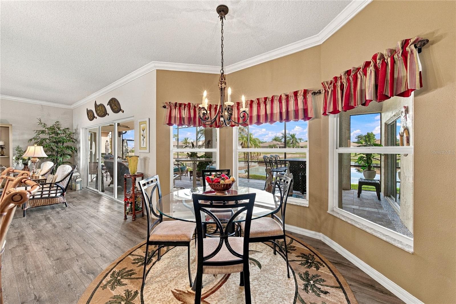 The dinette is perfect for those casual meals while affording a great view of the pond behind. - 4232 DORNOCH DR, LAKE WALES