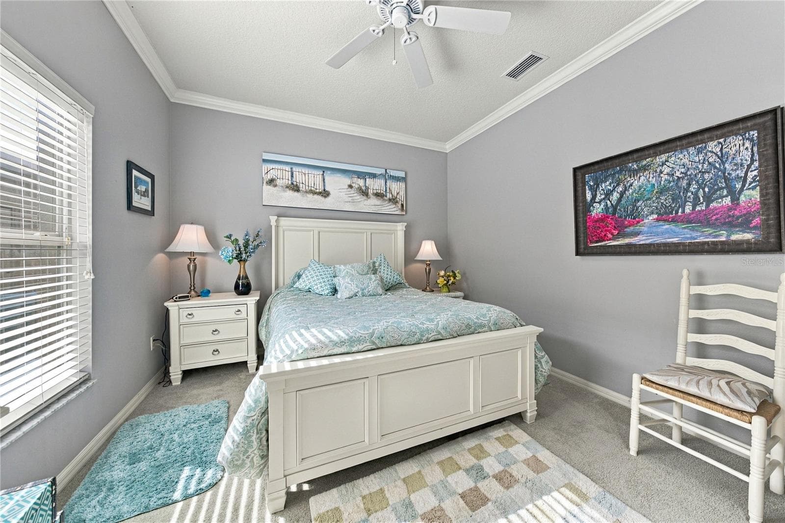 The second bedroom has crown molding and window treatments. - 4232 DORNOCH DR, LAKE WALES