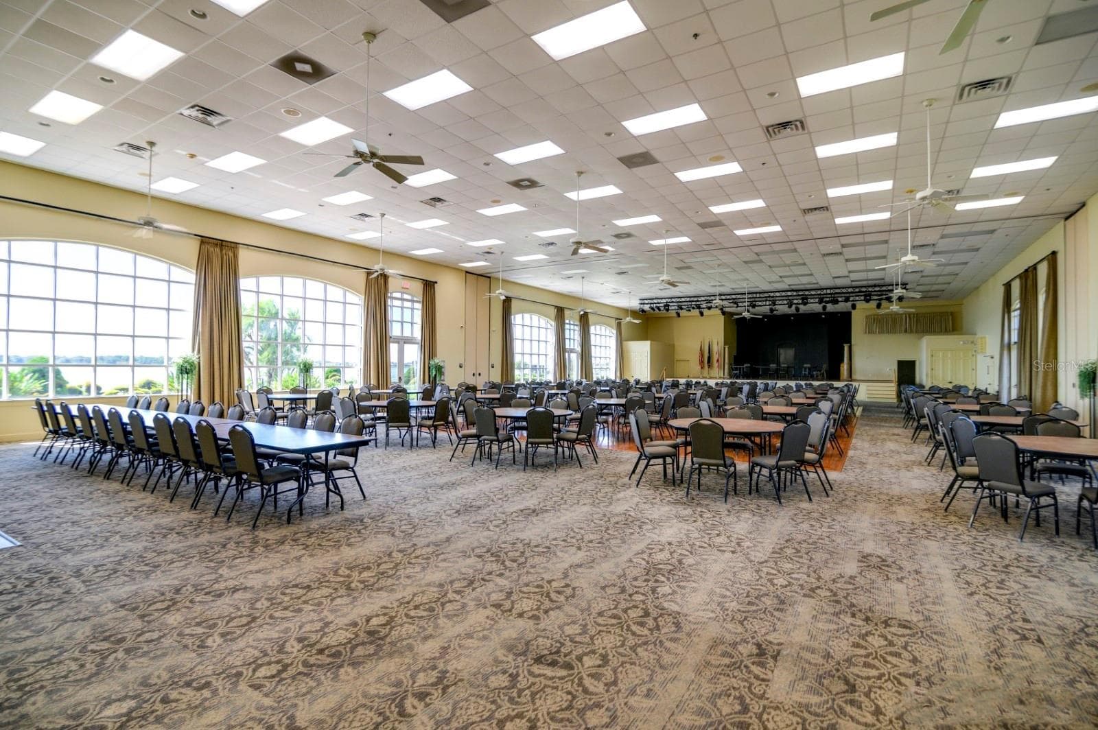 The main clubhouse ballroom has a fully equipped stage where local and touring professionals perform. Many social events occur here, including bingo. - 4232 DORNOCH DR, LAKE WALES